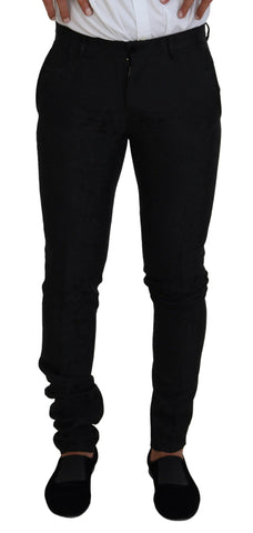 Black polyester men's two-piece martini suit by Dolce & Gabbana, featuring a tailored jacket and matching trousers.
