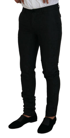 Black polyester men's two-piece Martini suit by Dolce & Gabbana, showing the tailored jacket and matching trousers.