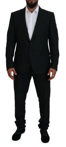 Black Dolce & Gabbana single-breasted two-piece Martini suit, tailored fit with notch lapel and sleek design, front view.
