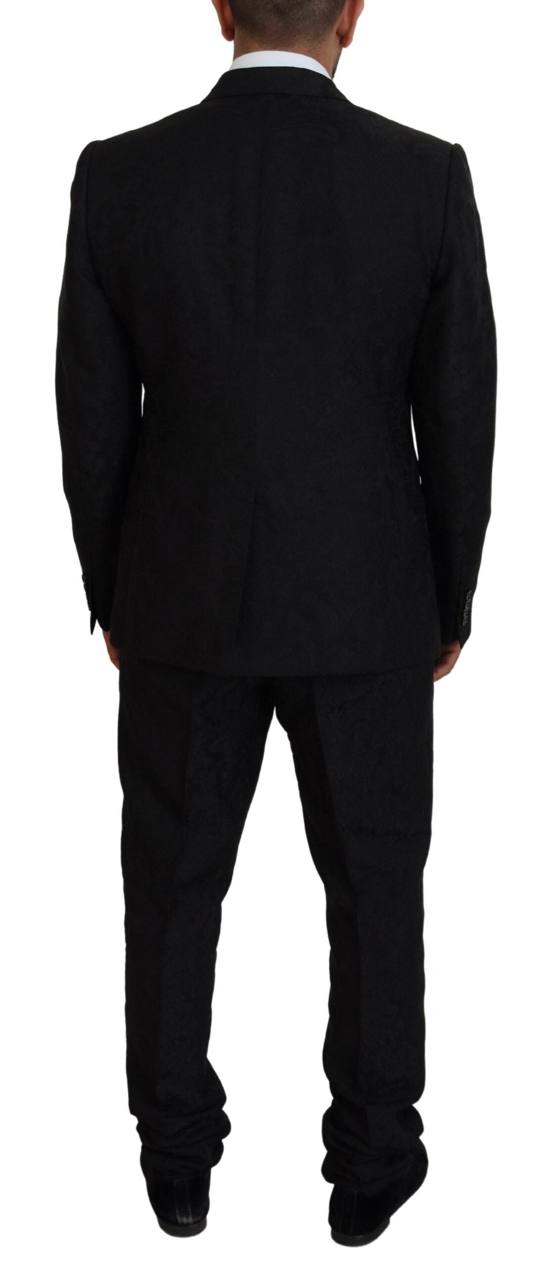 Black single-breasted 2-piece Martini suit by Dolce & Gabbana, featuring classic lapels and tailored fit on a mannequin.
