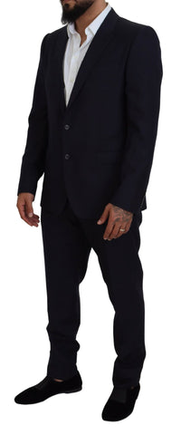 Blue single-breasted two-piece Martini suit by Dolce & Gabbana, featuring tailored fit and classic lapel design.