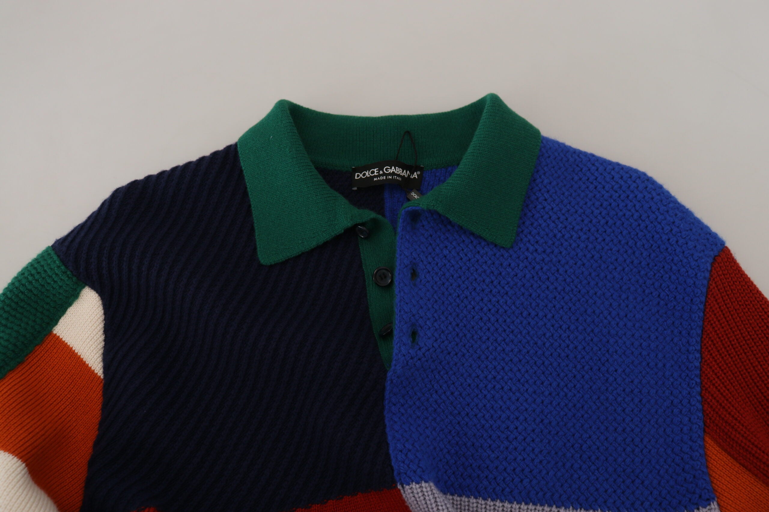 Multicolor striped wool pullover sweater by Dolce & Gabbana featuring vibrant horizontal stripes and a cozy knit texture.