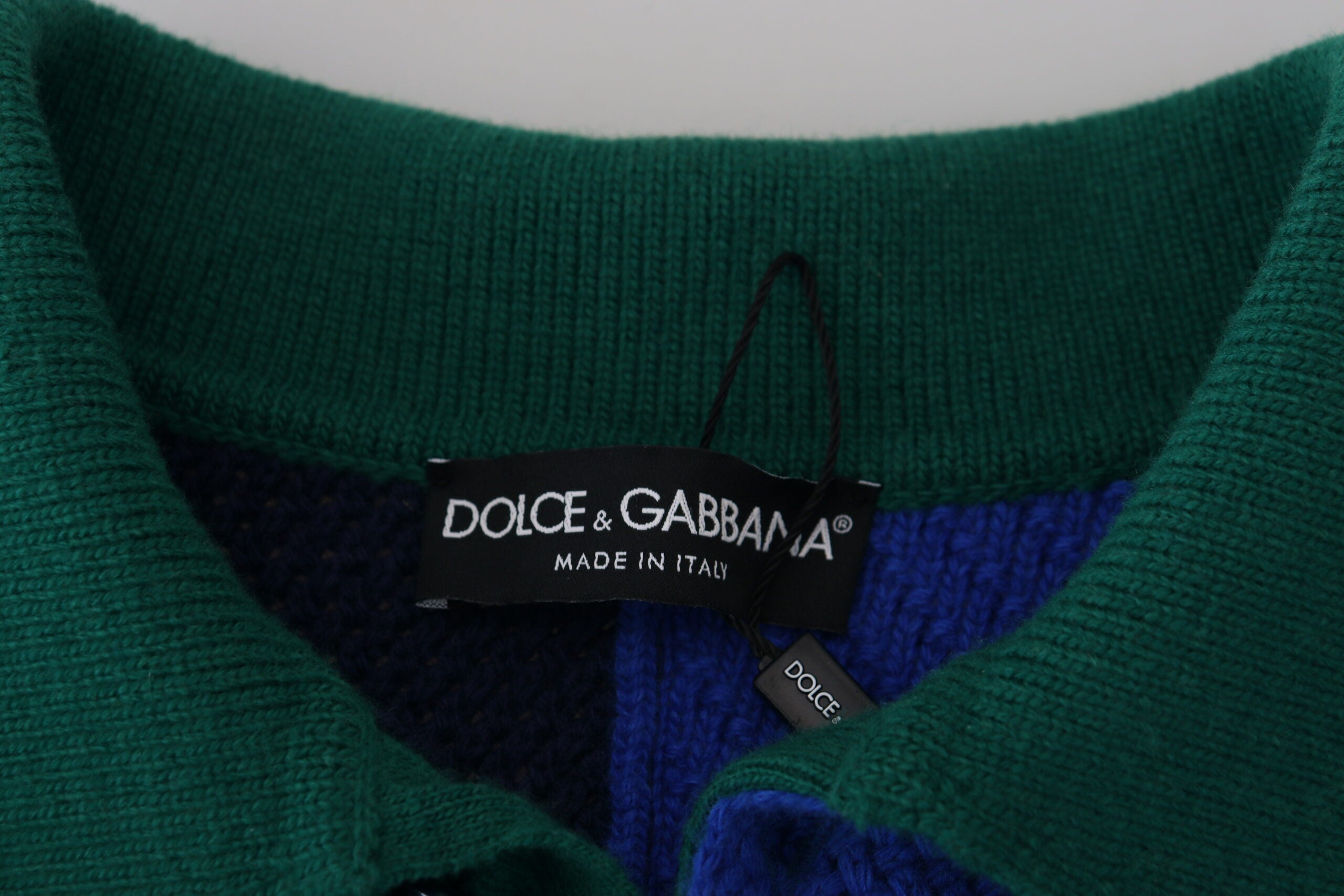 Multicolor striped wool pullover sweater by Dolce & Gabbana, featuring vibrant horizontal stripe patterns and a cozy fit.