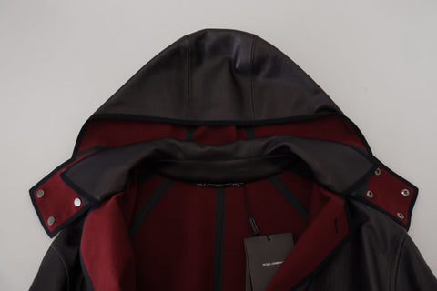 Black trench hooded parka cotton jacket by Dolce & Gabbana, featuring a classic design with a hood and button details.
