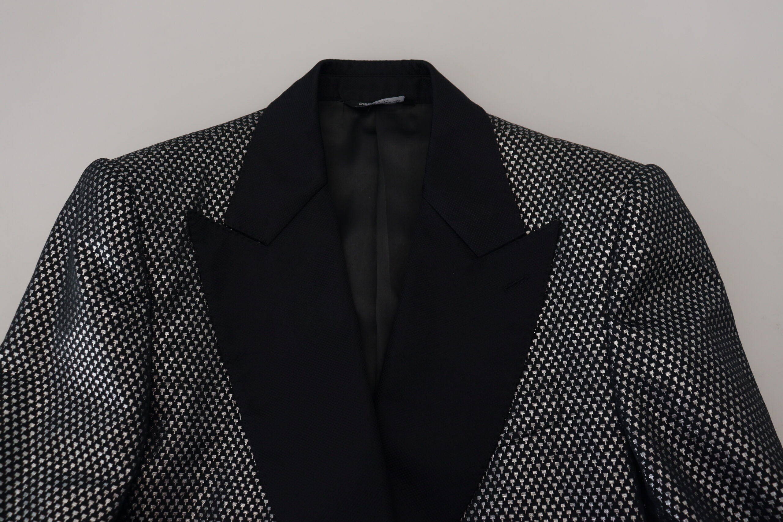 Black and silver jacquard slim fit blazer jacket by Dolce & Gabbana, featuring intricate woven pattern and tailored design.