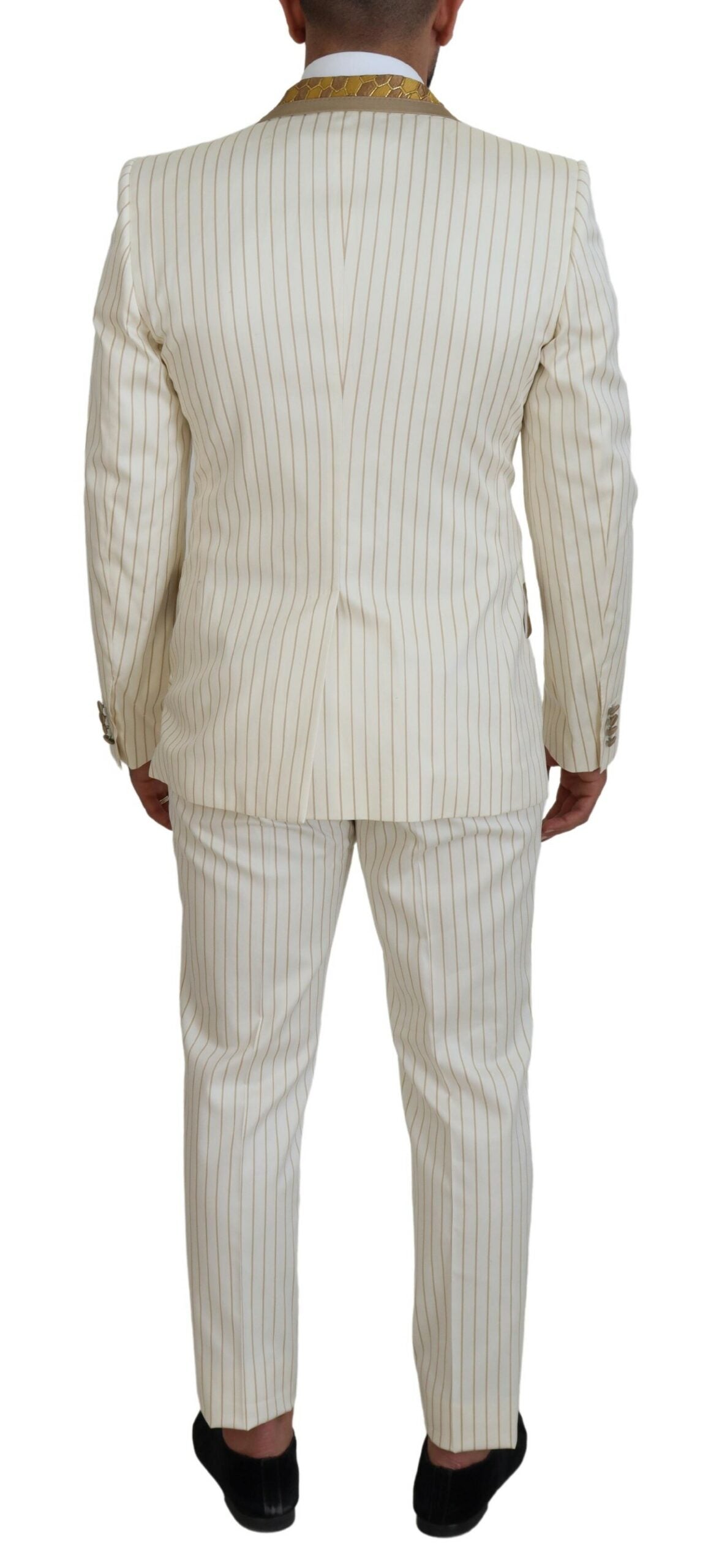 Dolce & Gabbana Off White gold striped slim fit tuxedo suit with tailored jacket and matching trousers, stylish formal wear.