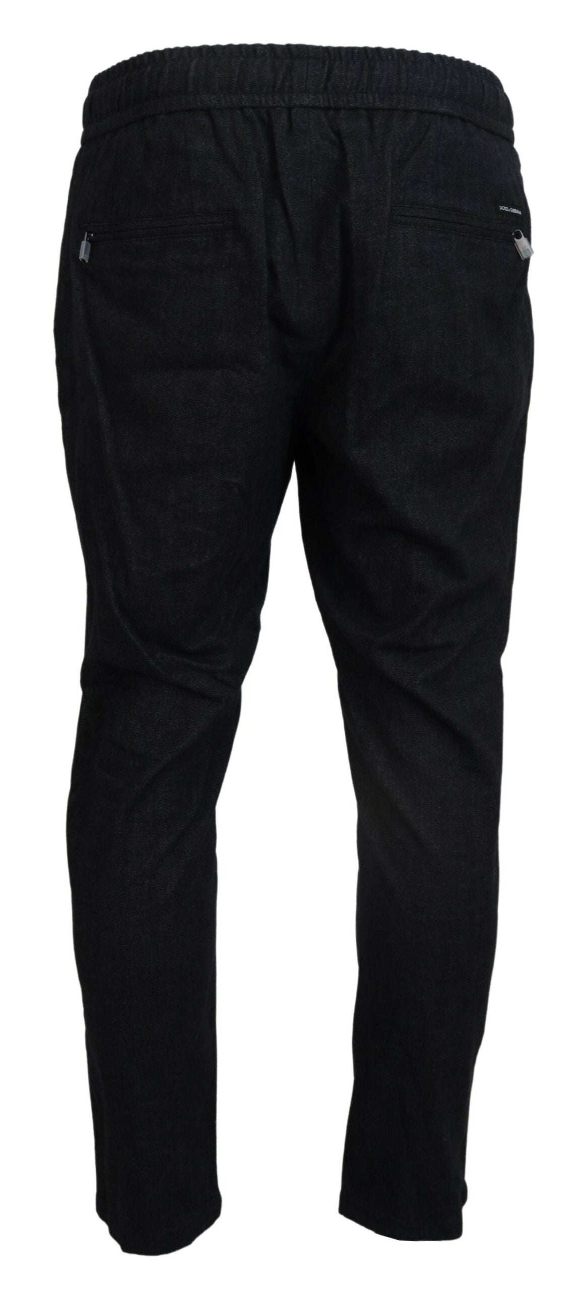 Gray cotton tapered pants by Dolce & Gabbana, featuring a relaxed fit and classic design, shown on a model.