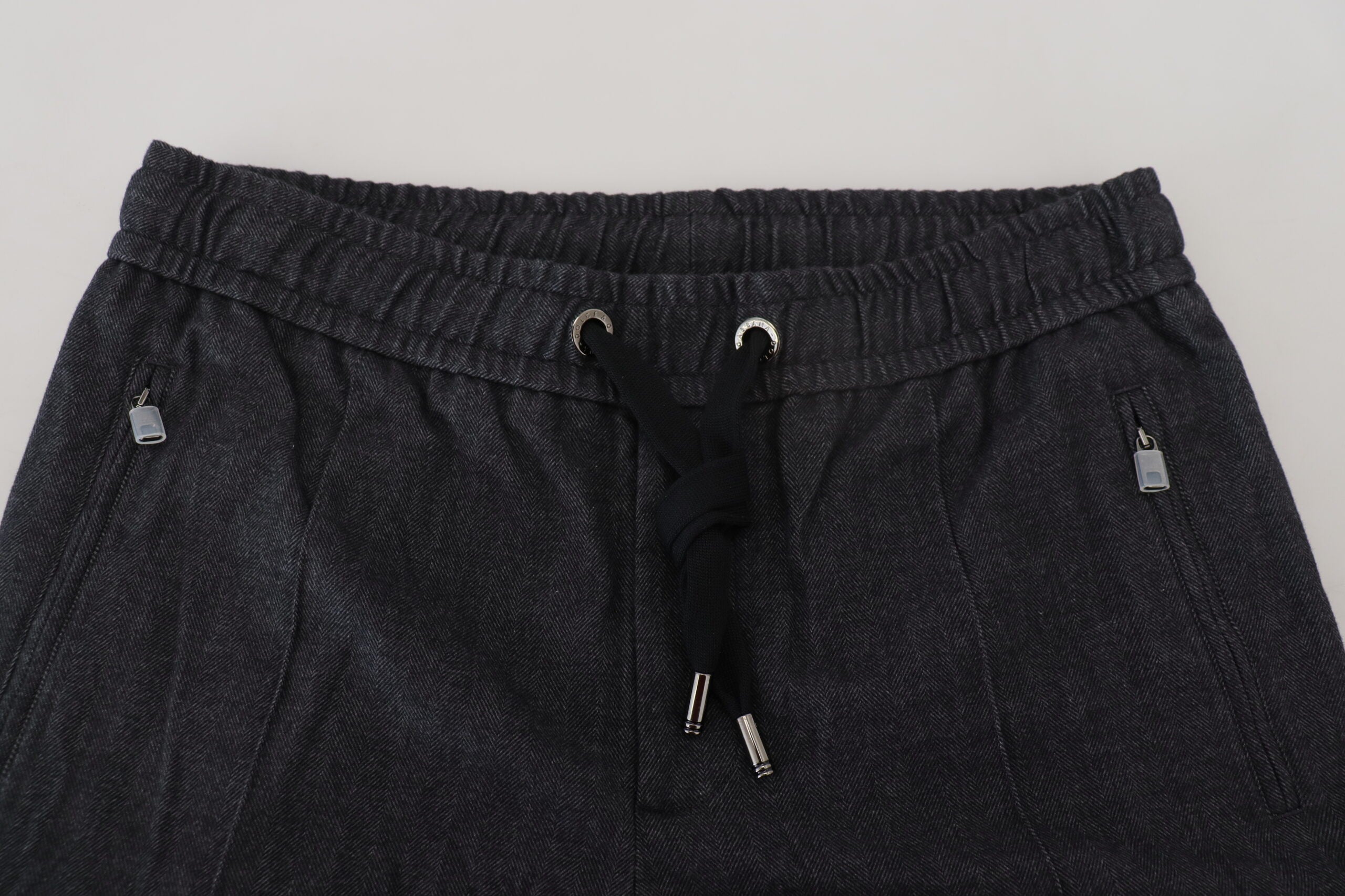 Grey cotton tapered pants by Dolce & Gabbana, showing a relaxed fit with subtle fabric texture and clean design.