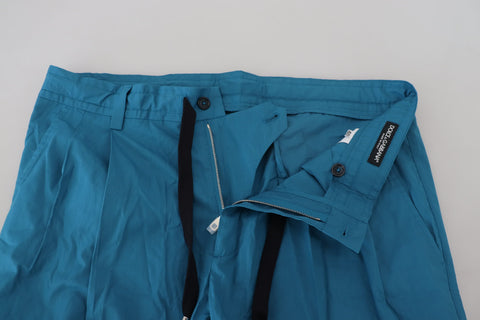 Blue cotton chinos trousers from Dolce & Gabbana, featuring a slim fit and classic pocket design.