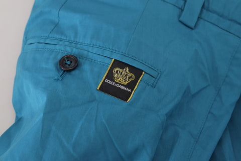 Blue cotton chinos trousers from Dolce & Gabbana, showing a slim-fit design with front and back pockets.