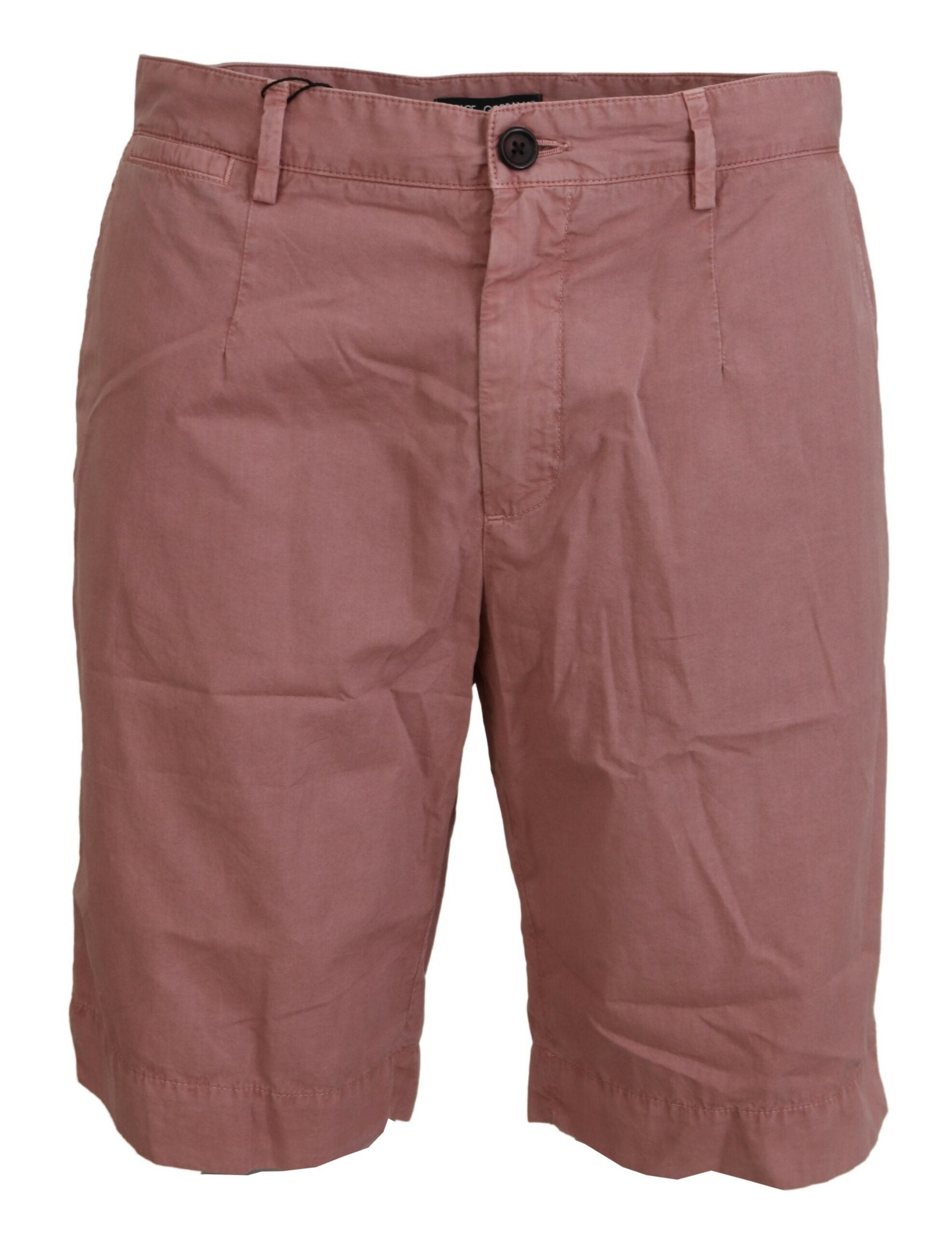 Pink cotton casual men's chino shorts from Dolce & Gabbana, featuring a relaxed fit and classic design.