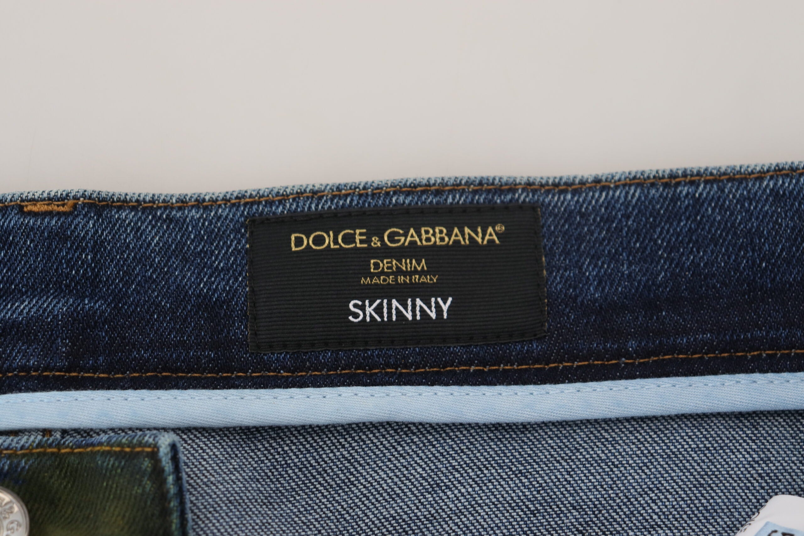 Blue and green Dolce & Gabbana skinny cotton denim jeans with a fitted style and classic five-pocket design.