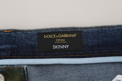 Blue and green Dolce & Gabbana skinny cotton denim jeans with a fitted style and classic five-pocket design.