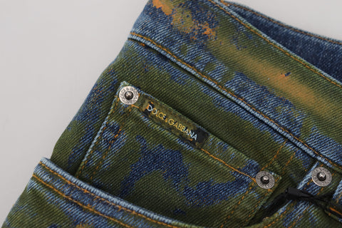 Blue and green skinny cotton denim jeans by Dolce & Gabbana, showing the fitted design and detailed stitching.