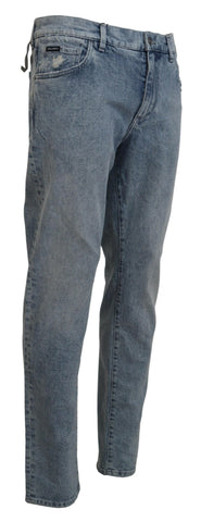 Slim fit blue cotton denim jeans by Dolce & Gabbana, showing front view with classic five-pocket design and subtle fading.