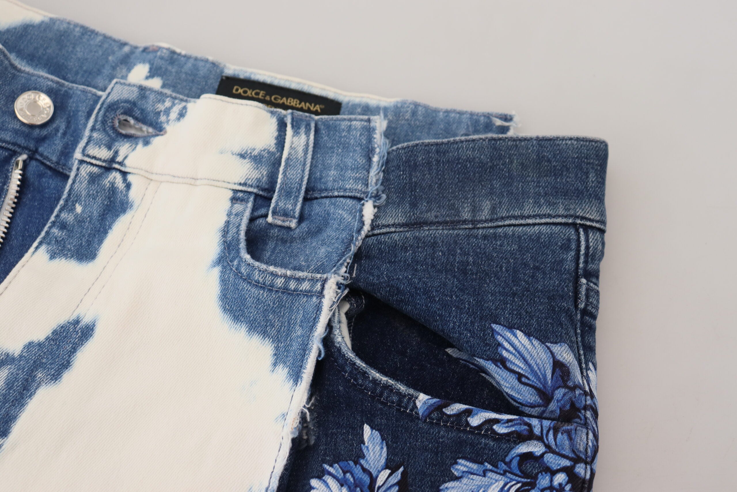 Blue Caesar denim cotton loose fit jeans by Dolce & Gabbana displayed on a hanger.