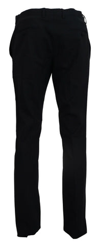 Blue wool stretch dress pants by Dolce & Gabbana, slim fit formal trousers with a tailored design and refined finish.
