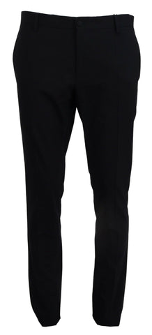 Blue wool stretch dress with slim fit design by Dolce & Gabbana, formal pant styled for elegant occasions.