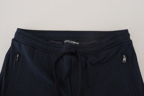 Blue men's sport cotton sweatpants from Dolce & Gabbana, featuring a relaxed fit and elastic waistband.
