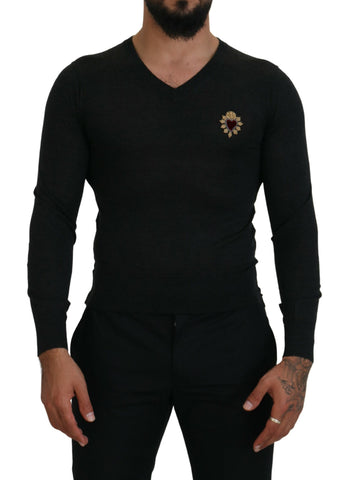 Gray cashmere V-neck sweater with gold heart detail by Dolce & Gabbana, showcasing the soft fabric and stylish design.