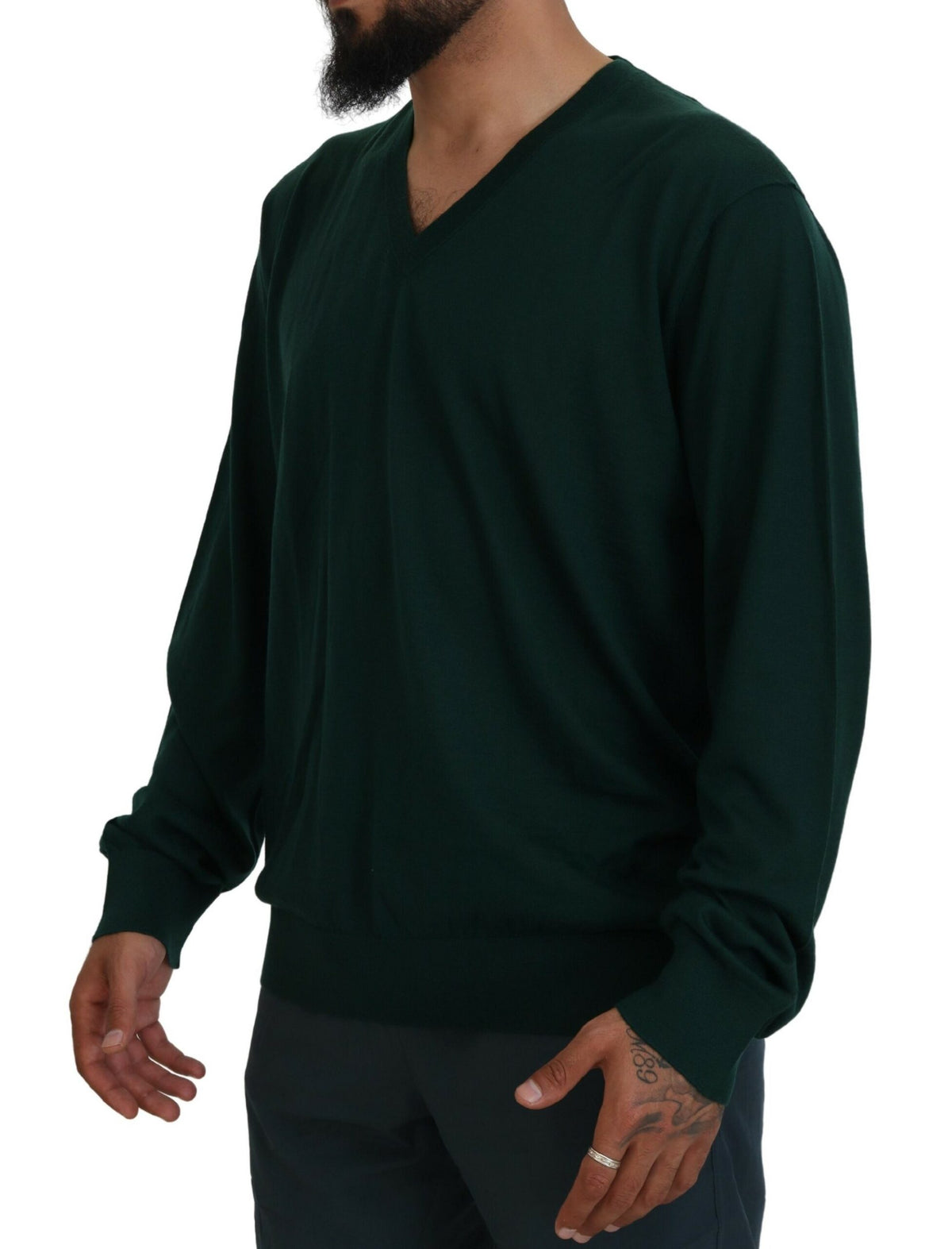 Green cashmere V-neck pullover sweater by Dolce & Gabbana, shown on a mannequin, highlighting soft fabric and classic fit.