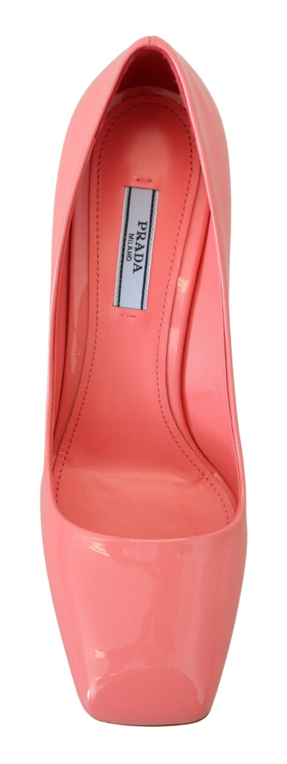Pink patent leather Prada block heel pumps with classic design, featuring a sleek and polished appearance.