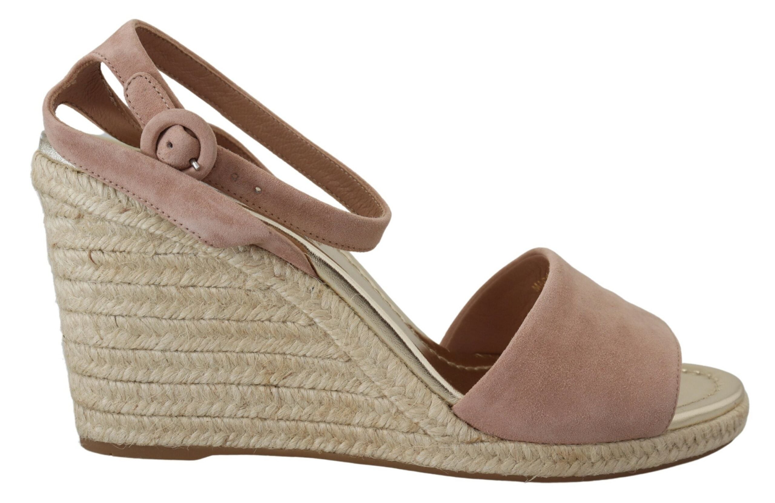 Pink suede leather ankle strap sandals by Prada with slender heel and elegant design.