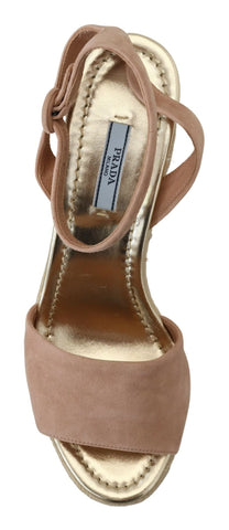 Pink suede leather ankle strap sandals by Prada with a sleek design and stylish ankle buckle.