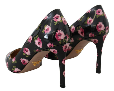 Black leather floral stilettos by Prada featuring elegant high heels and intricate floral detailing on the pumps.