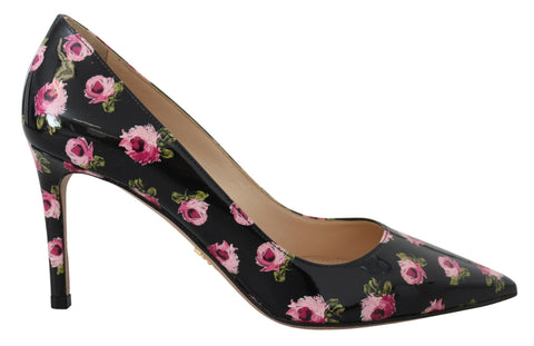 Black leather floral stiletto heels by Prada featuring pointed toes and elegant heel design.