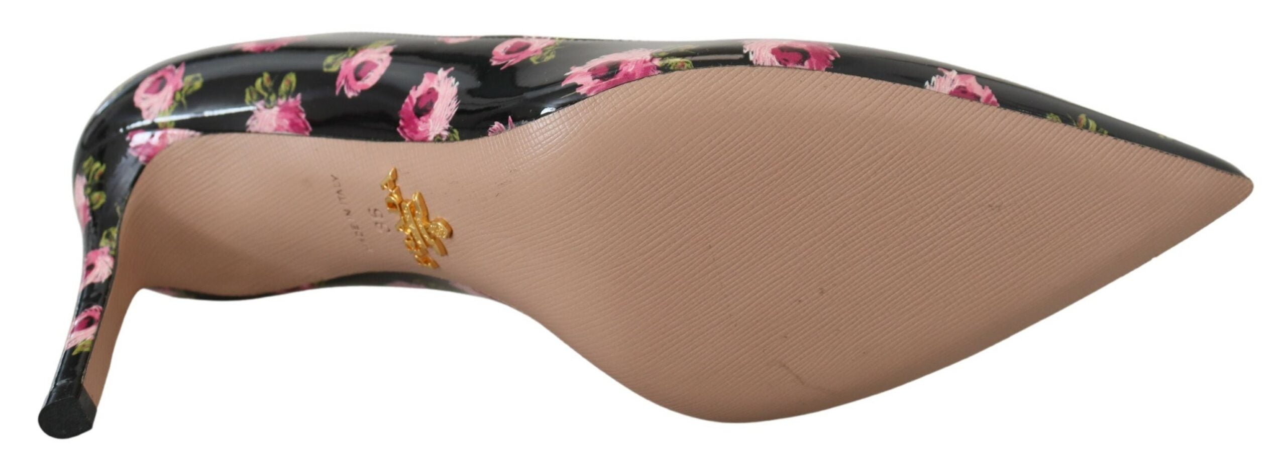 Black leather floral stilettos pumps by Prada featuring elegant design and pointed heels.