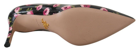 Black leather floral stilettos pumps by Prada featuring elegant design and pointed heels.