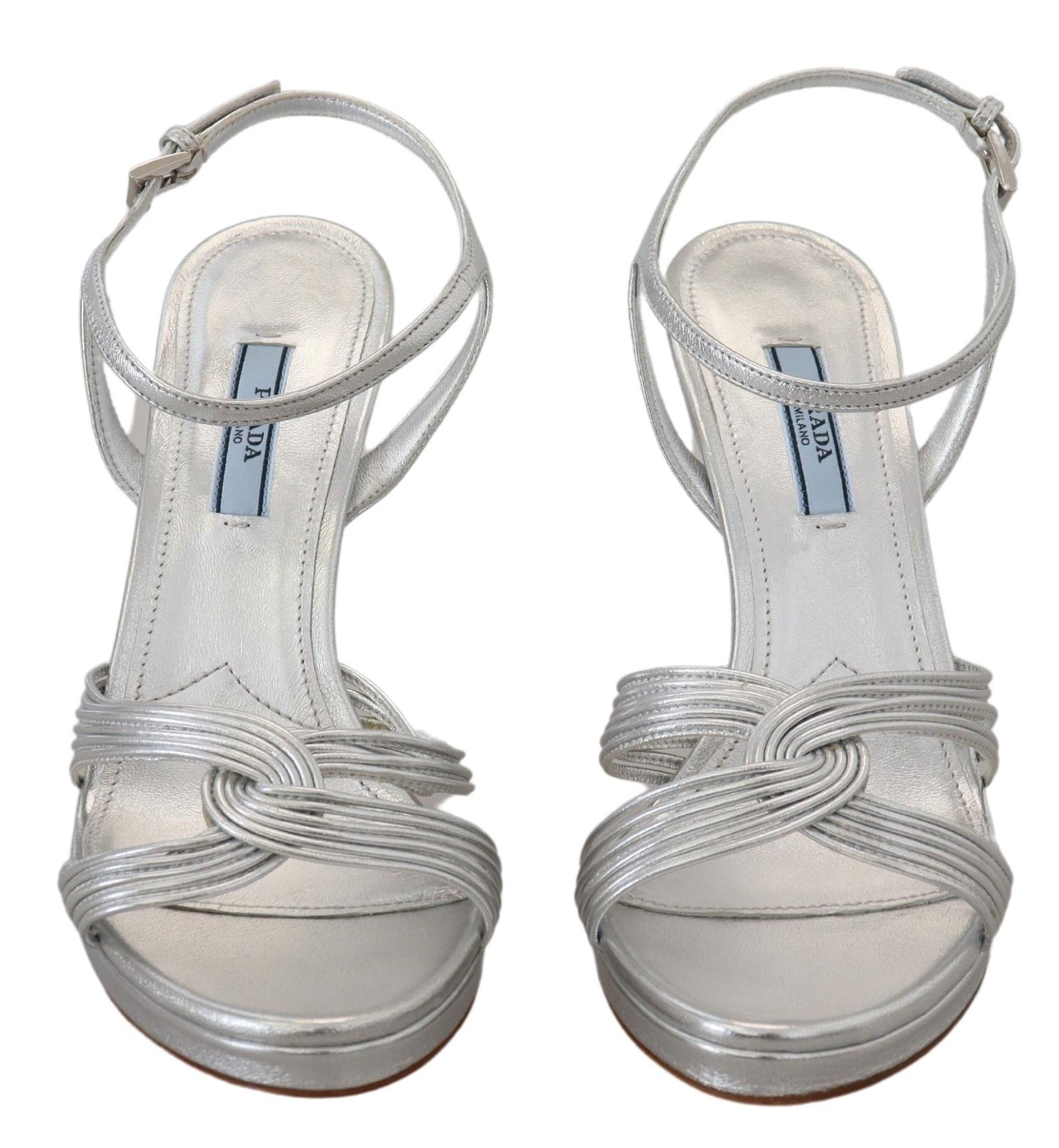 Silver leather Prada ankle strap stiletto sandals with heel and open toe, stylish footwear for women.