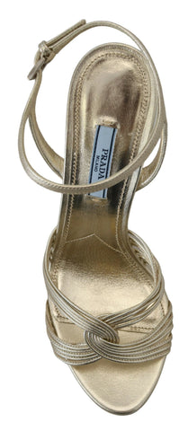 Prada gold leather ankle strap stiletto heels with open toes and sleek design, perfect for elegant summer footwear.