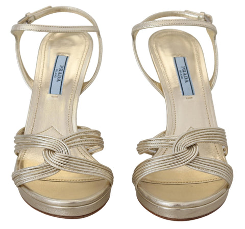 Prada gold leather ankle strap stiletto sandals with heel and open toe, stylish and elegant footwear for women.