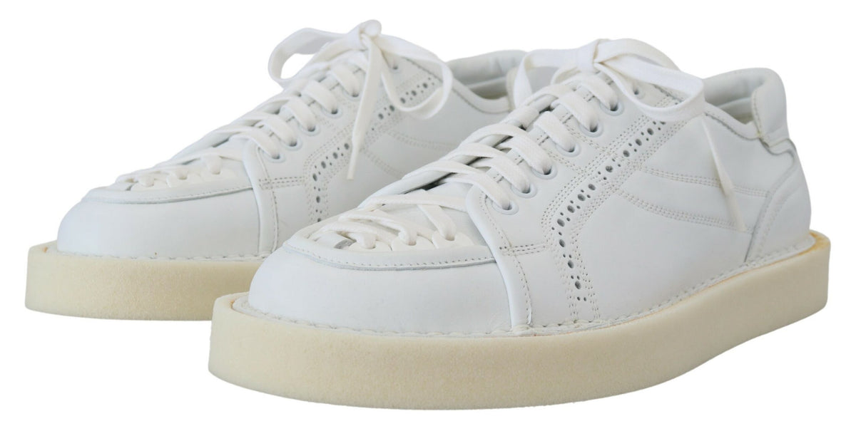 White leather low top Oxford sneakers by Dolce & Gabbana, showcasing sleek casual shoes with classic design and laces.