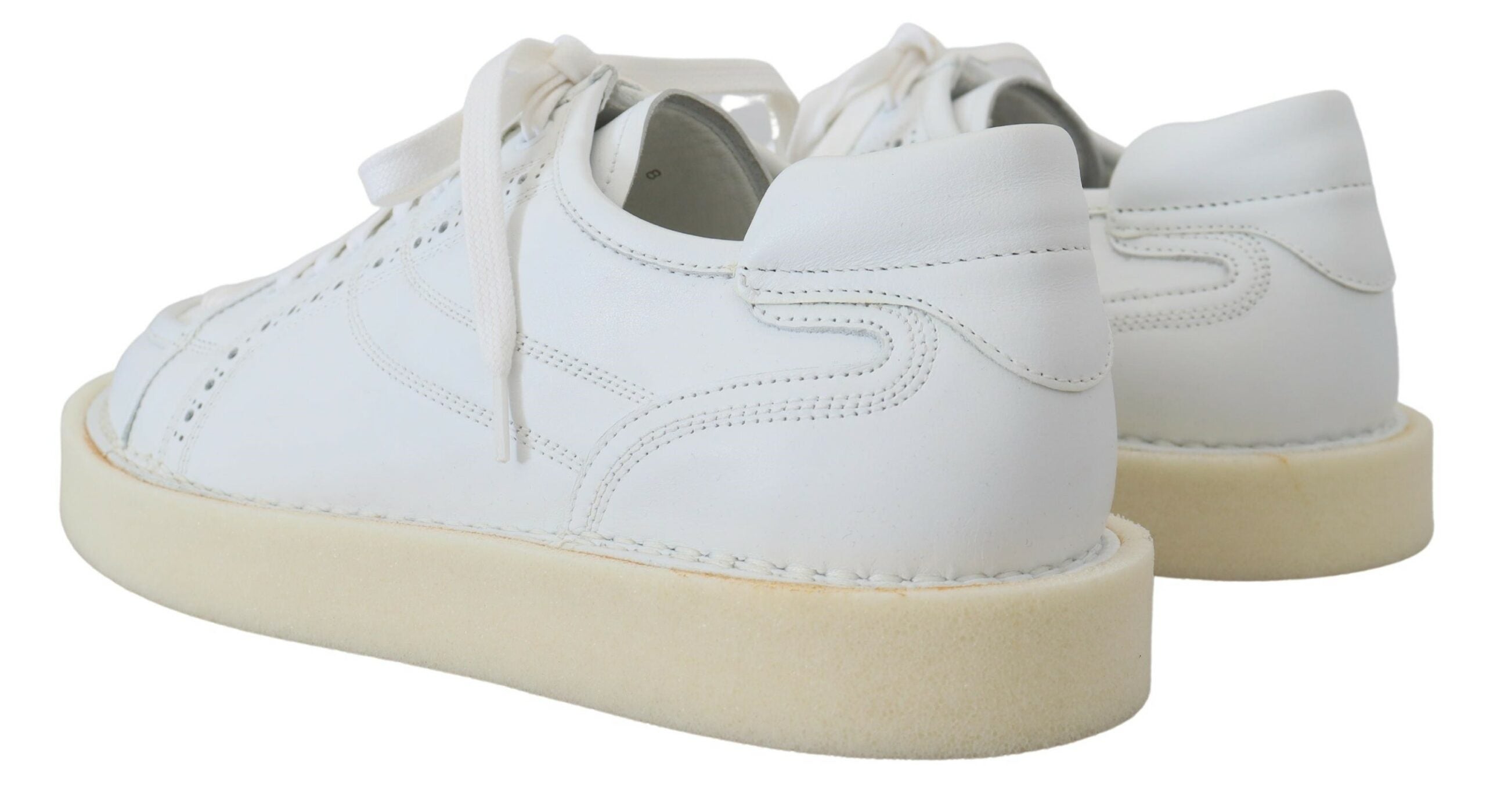 White leather low-top Oxford sneakers by Dolce & Gabbana, casual shoes with sleek design and lace-up front.