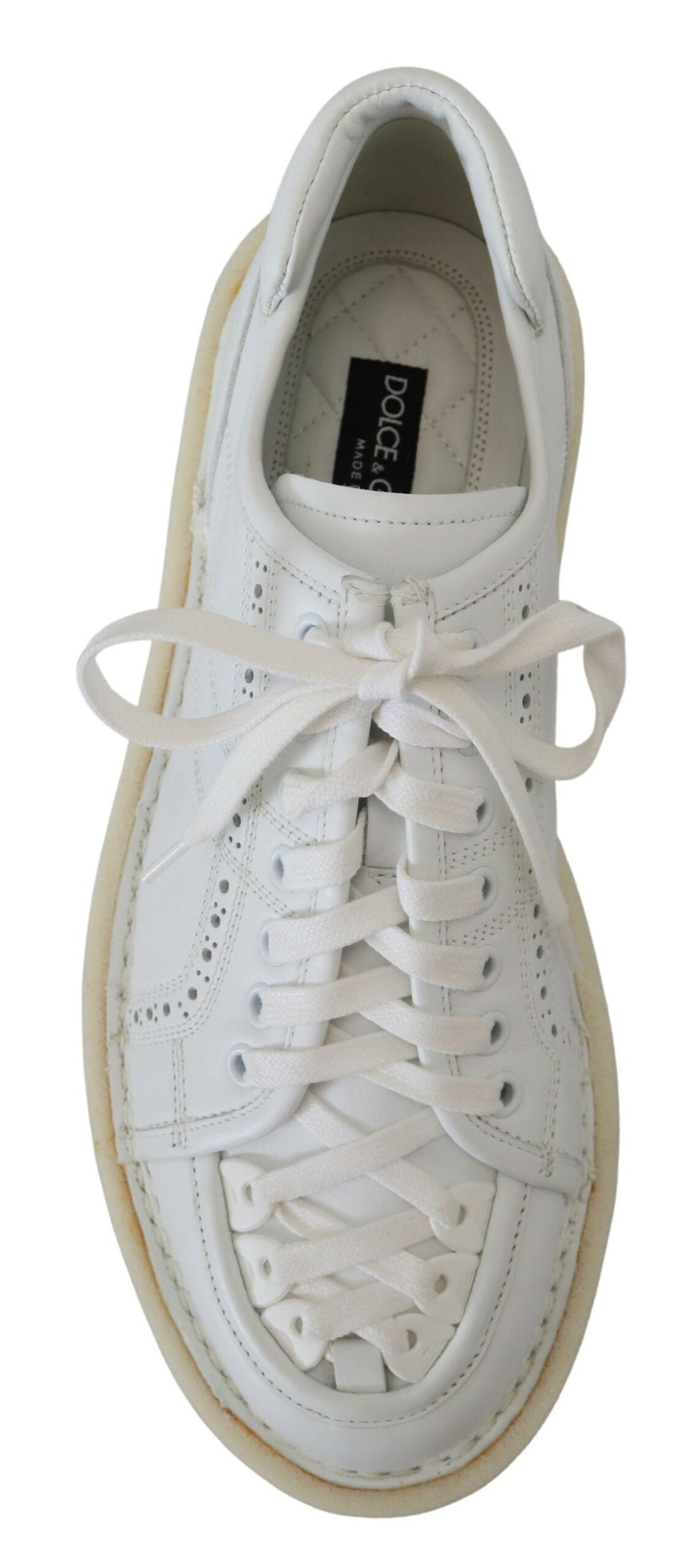 White leather low top Oxford sneakers by Dolce & Gabbana, casual shoes with stylish design and classic lace-up detail.