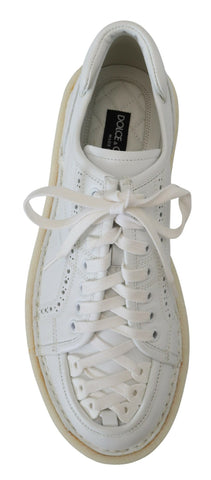 White leather low top Oxford sneakers by Dolce & Gabbana, casual shoes with stylish design and classic lace-up detail.