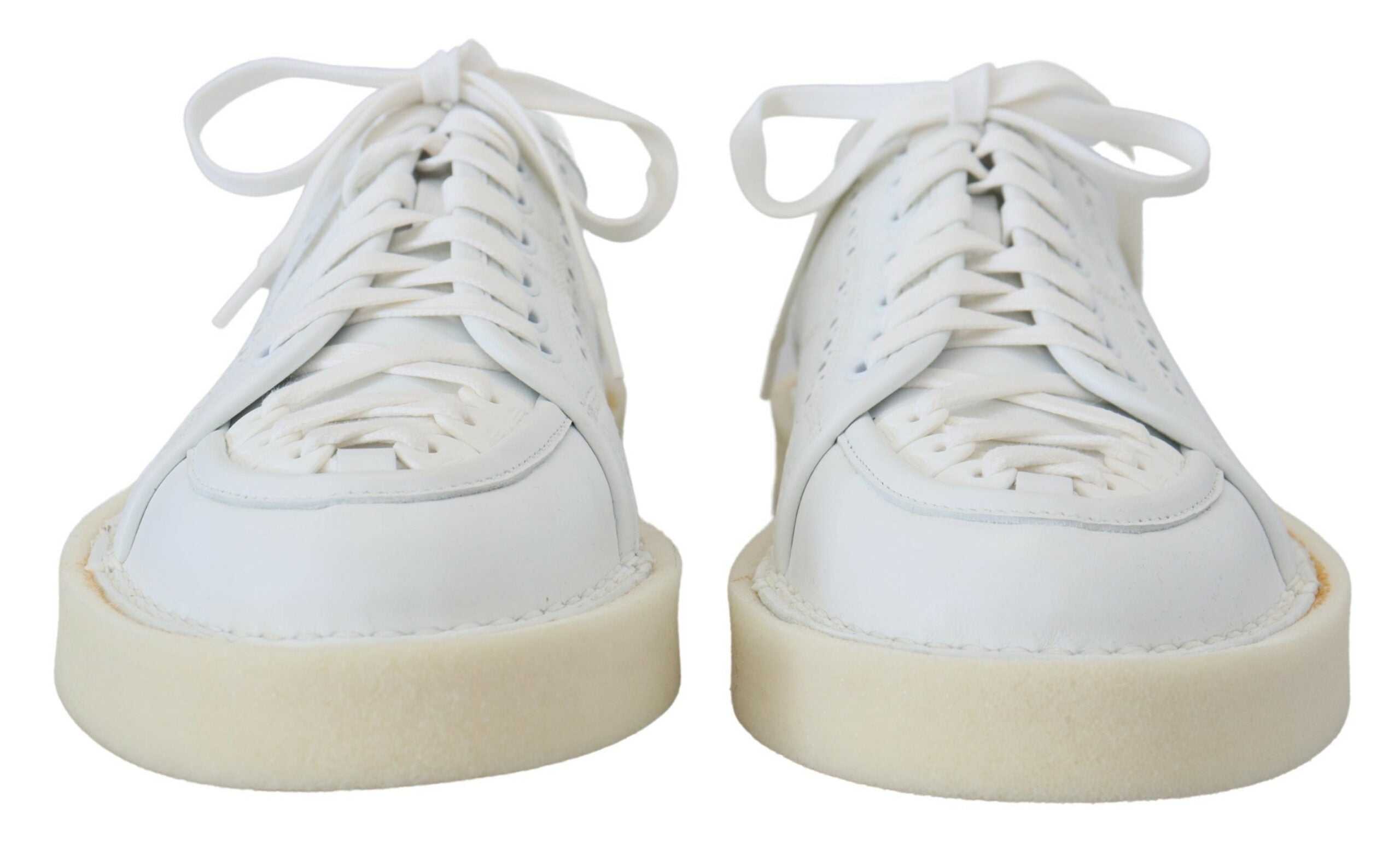 White leather low top Oxford sneakers by Dolce & Gabbana, casual shoes with sleek design and lace-up closure.