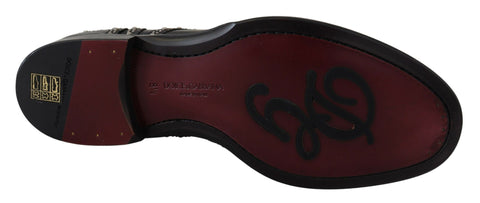 Black leather derby dress shoes with studded accents from Dolce & Gabbana, featuring a polished finish and classic design.
