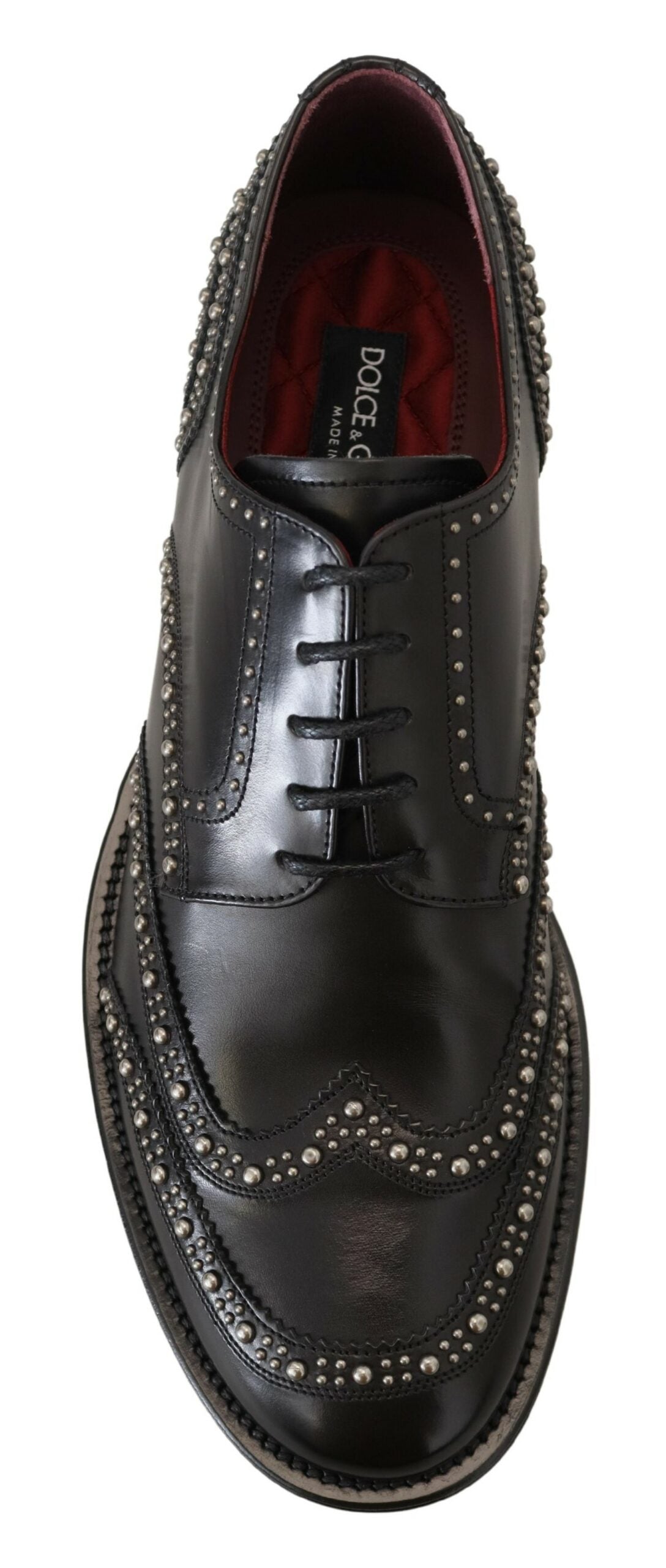 Black leather Derby dress shoes with studded details by Dolce & Gabbana, featuring a sleek and polished design.