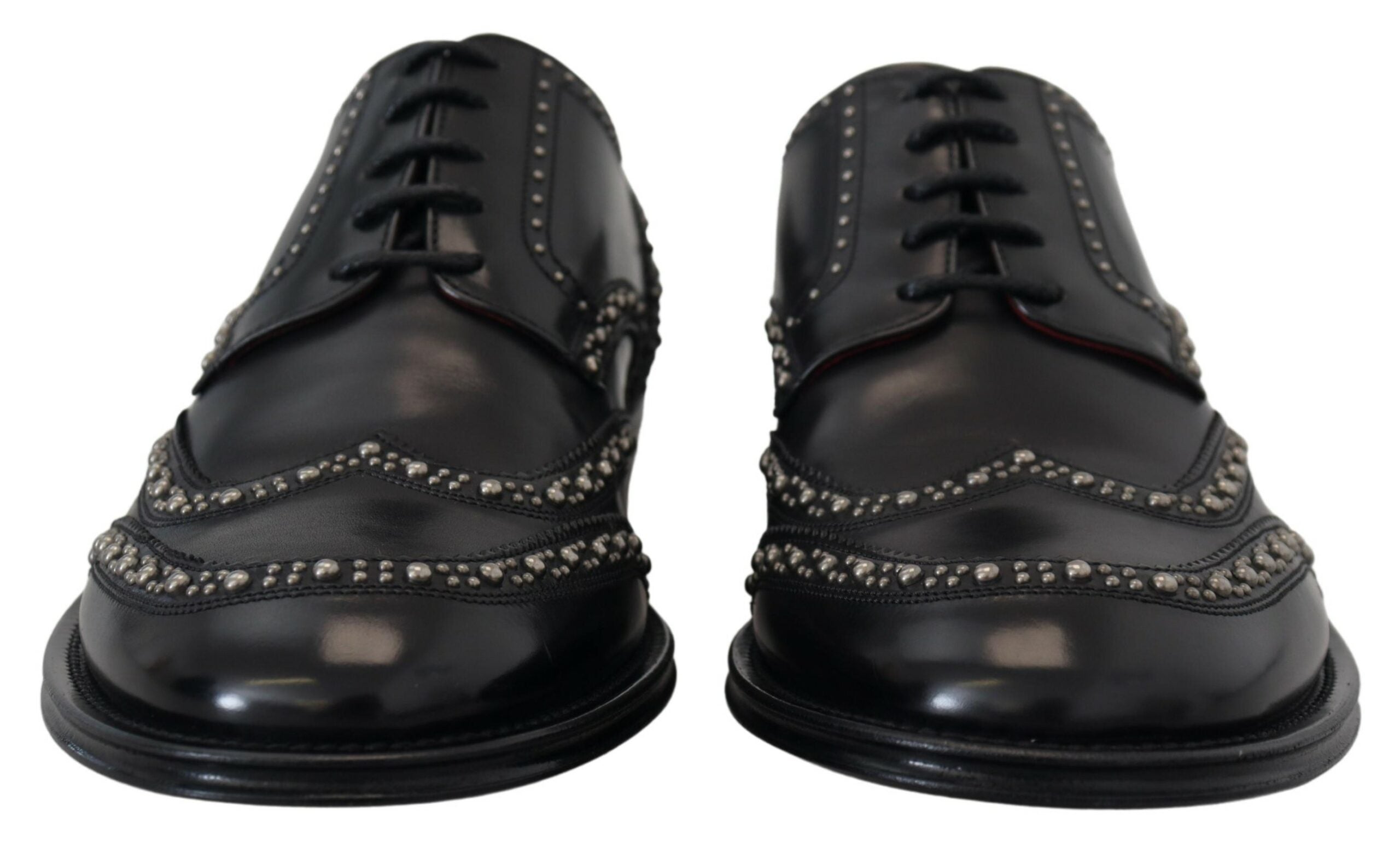Black leather Derby dress shoes with studded accents by Dolce & Gabbana, featuring sleek design and polished finish.