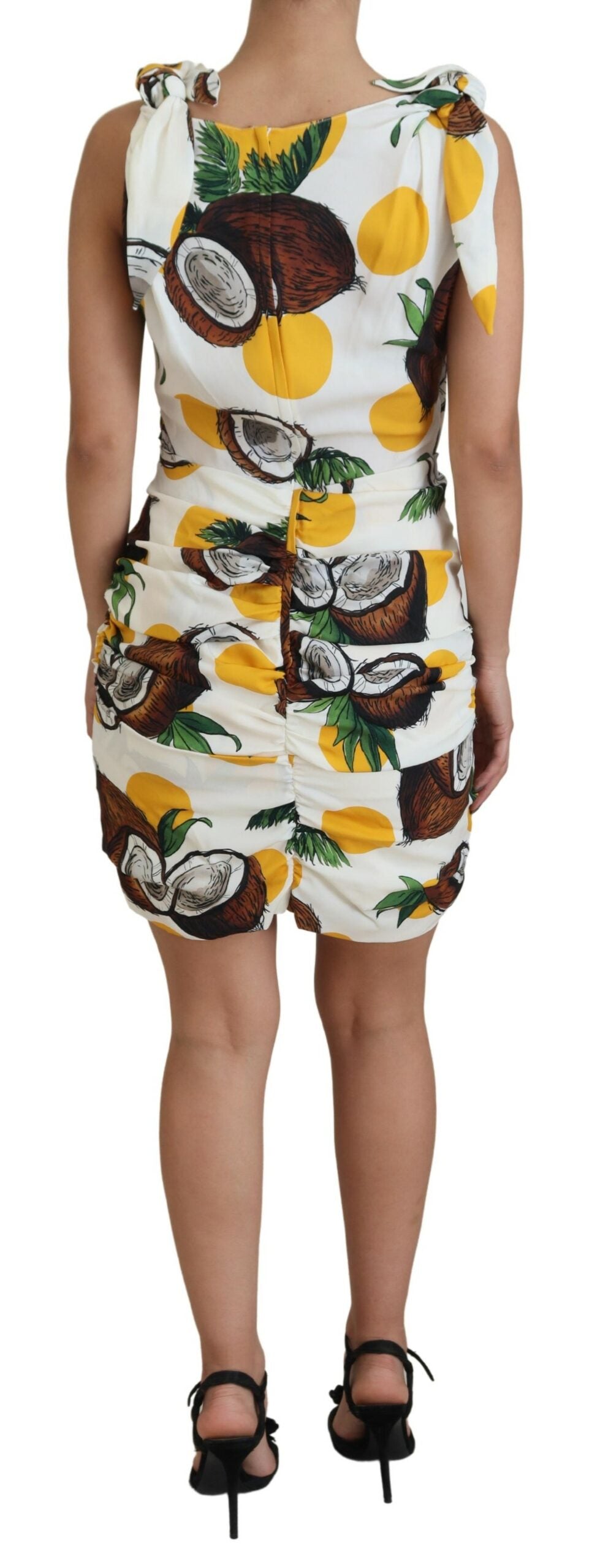 White silk sheath mini dress with coconut print by Dolce & Gabbana, featuring a fitted silhouette and elegant design.