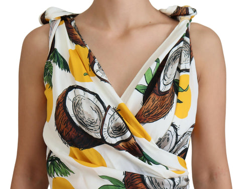 White coconut print silk sheath mini dress by Dolce & Gabbana, featuring a fitted silhouette and vibrant tropical pattern.