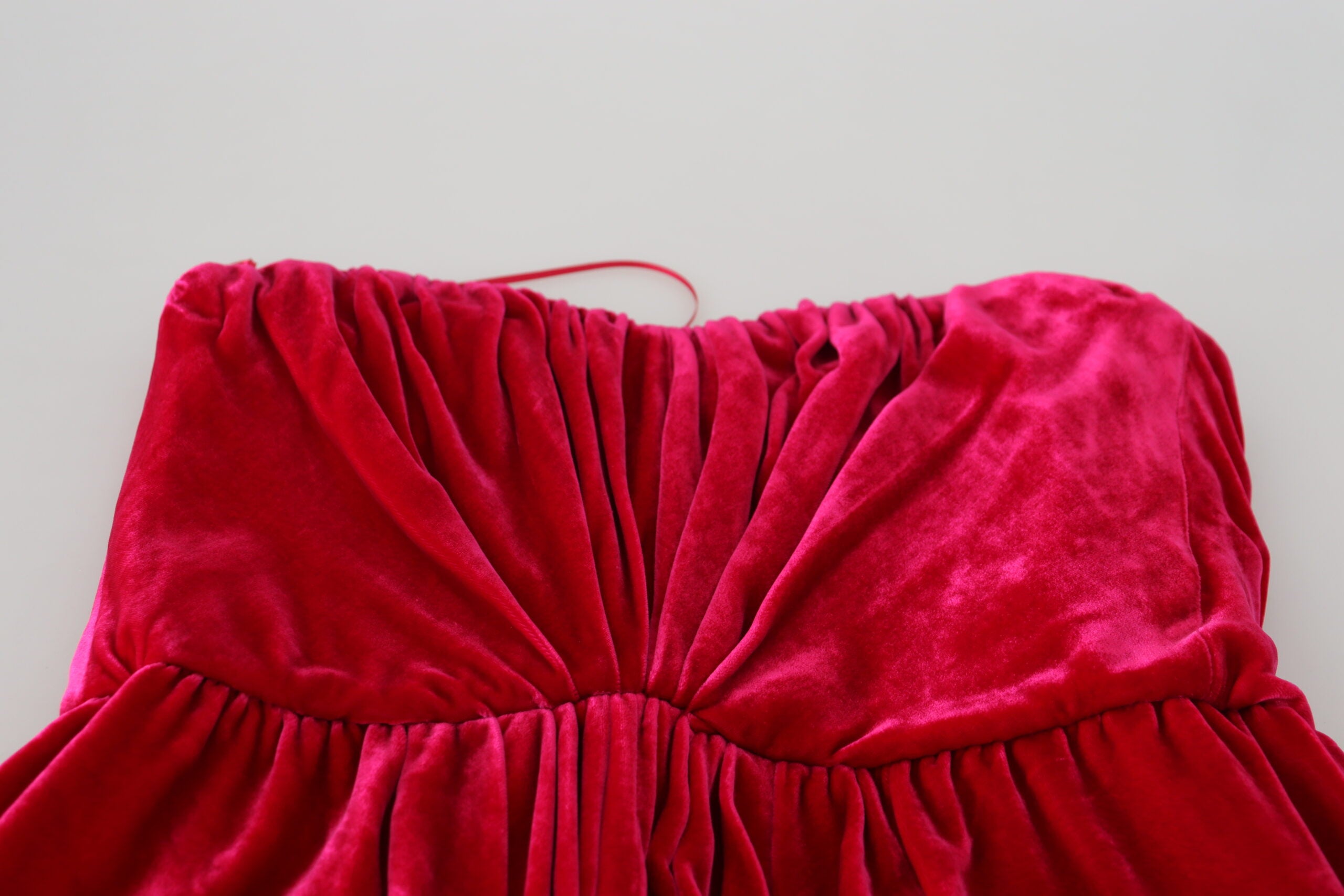 Pink viscose stretch strapless A-line dress by Dolce & Gabbana, showcasing a fitted bodice and flowing skirt.