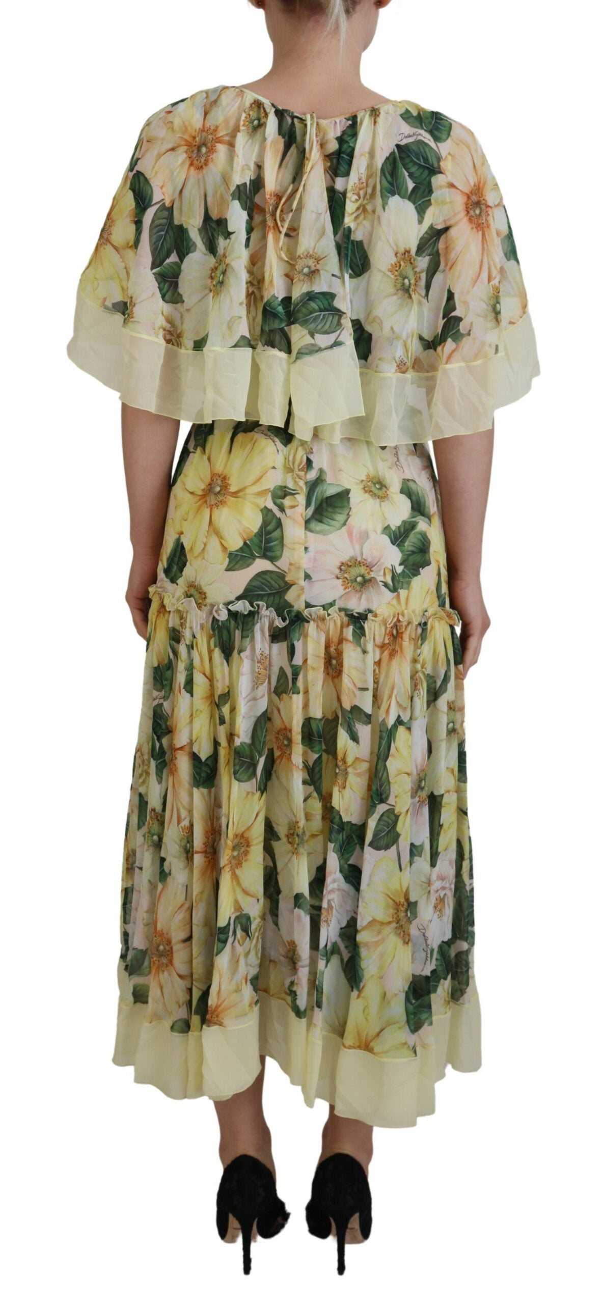 Multicolor silk floral print long maxi dress by Dolce & Gabbana, flowing fabric with vibrant floral patterns.