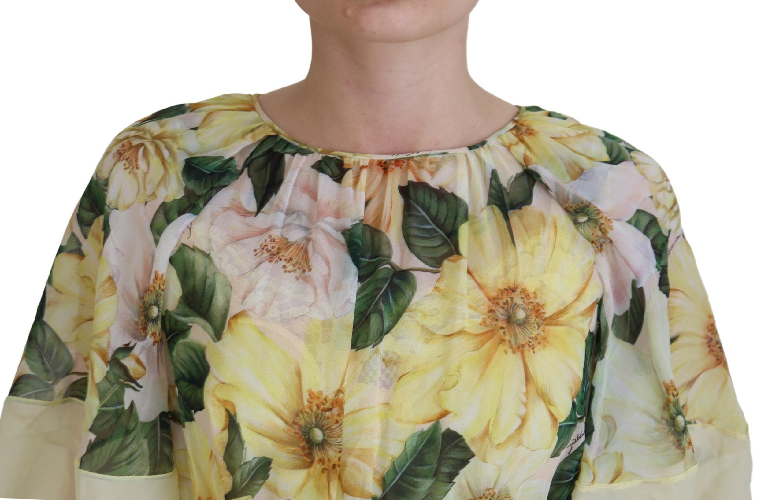 Multicolor silk floral print long maxi dress by Dolce & Gabbana, flowing fabric with vibrant floral patterns.