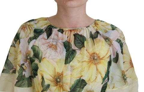 Multicolor silk floral print long maxi dress by Dolce & Gabbana, flowing fabric with vibrant floral patterns.