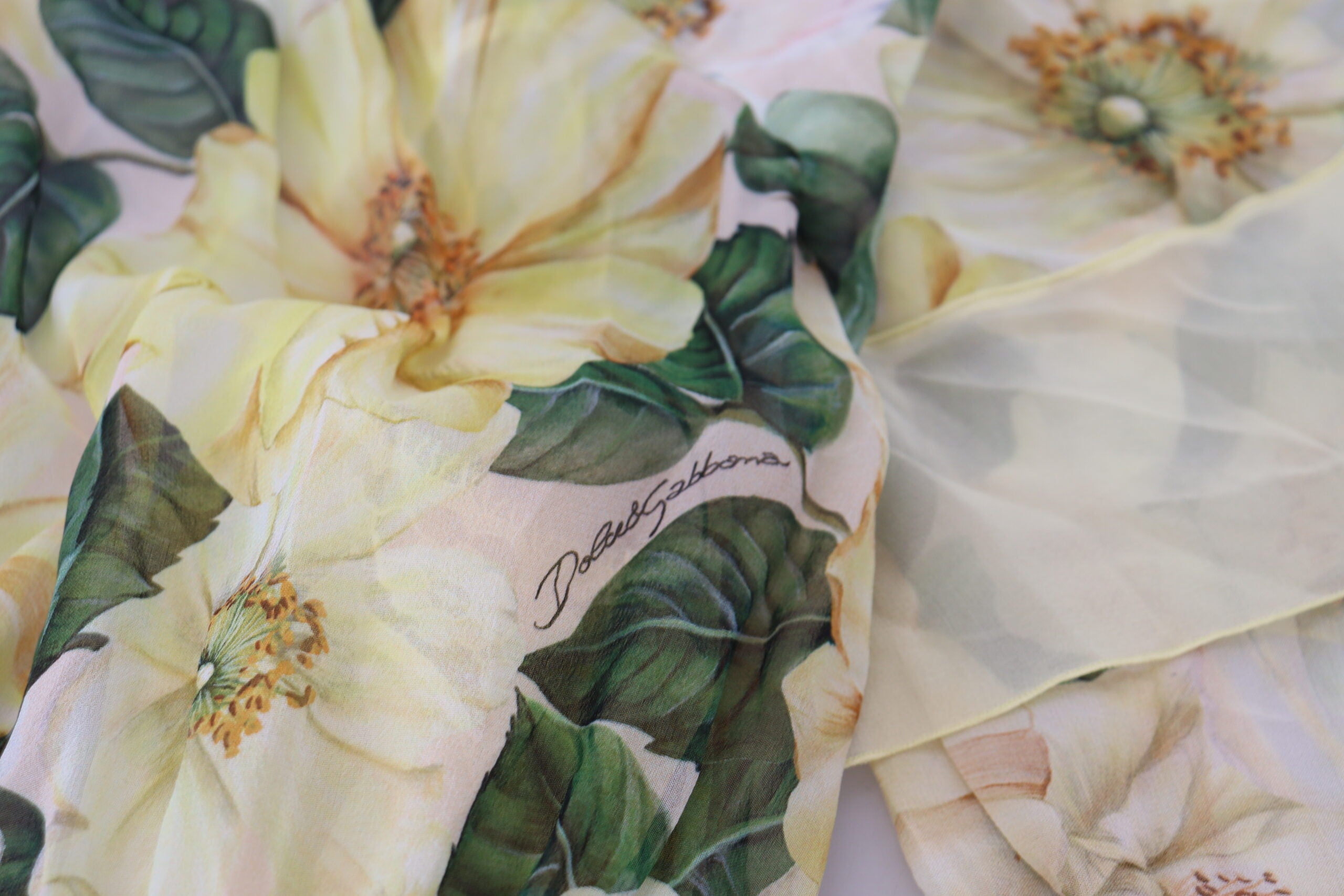 Multicolor silk floral print long maxi dress by Dolce & Gabbana, featuring vibrant patterns and flowing fabric.